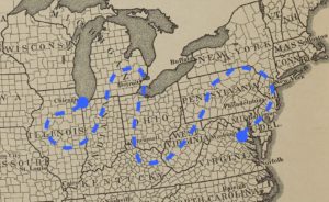 An old map of the northeast united states with a winding dashed line between DC and Chicago.