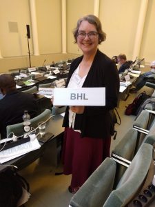 Connie Rinaldo holds a BHL placard